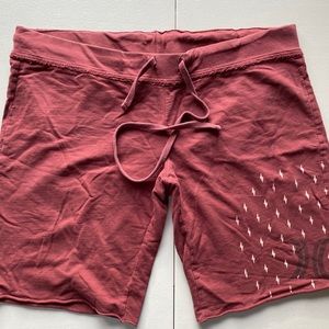 Maroon athleisure shorts.